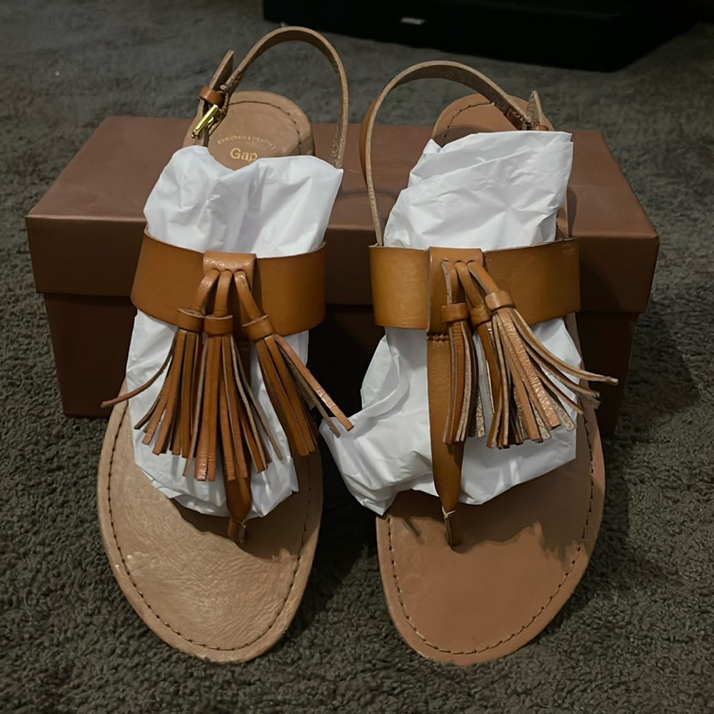 Woman’s leather sandal.  Gap